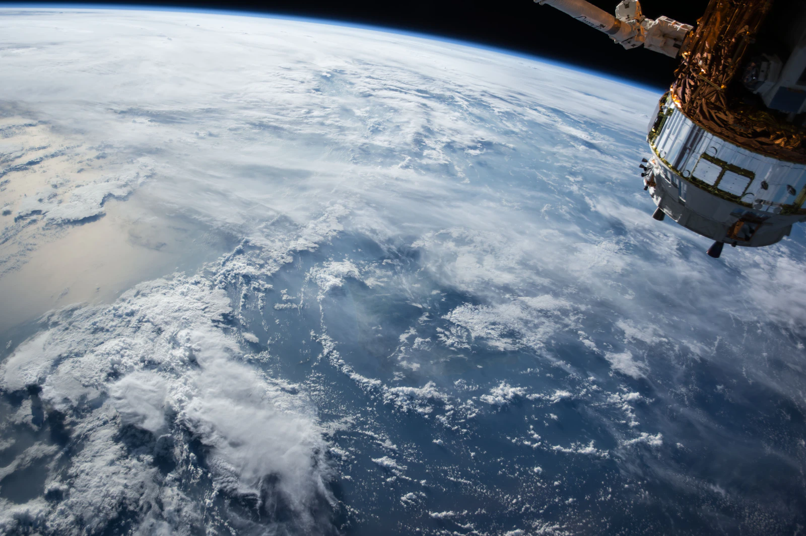 A spacecraft orbiting above Earth